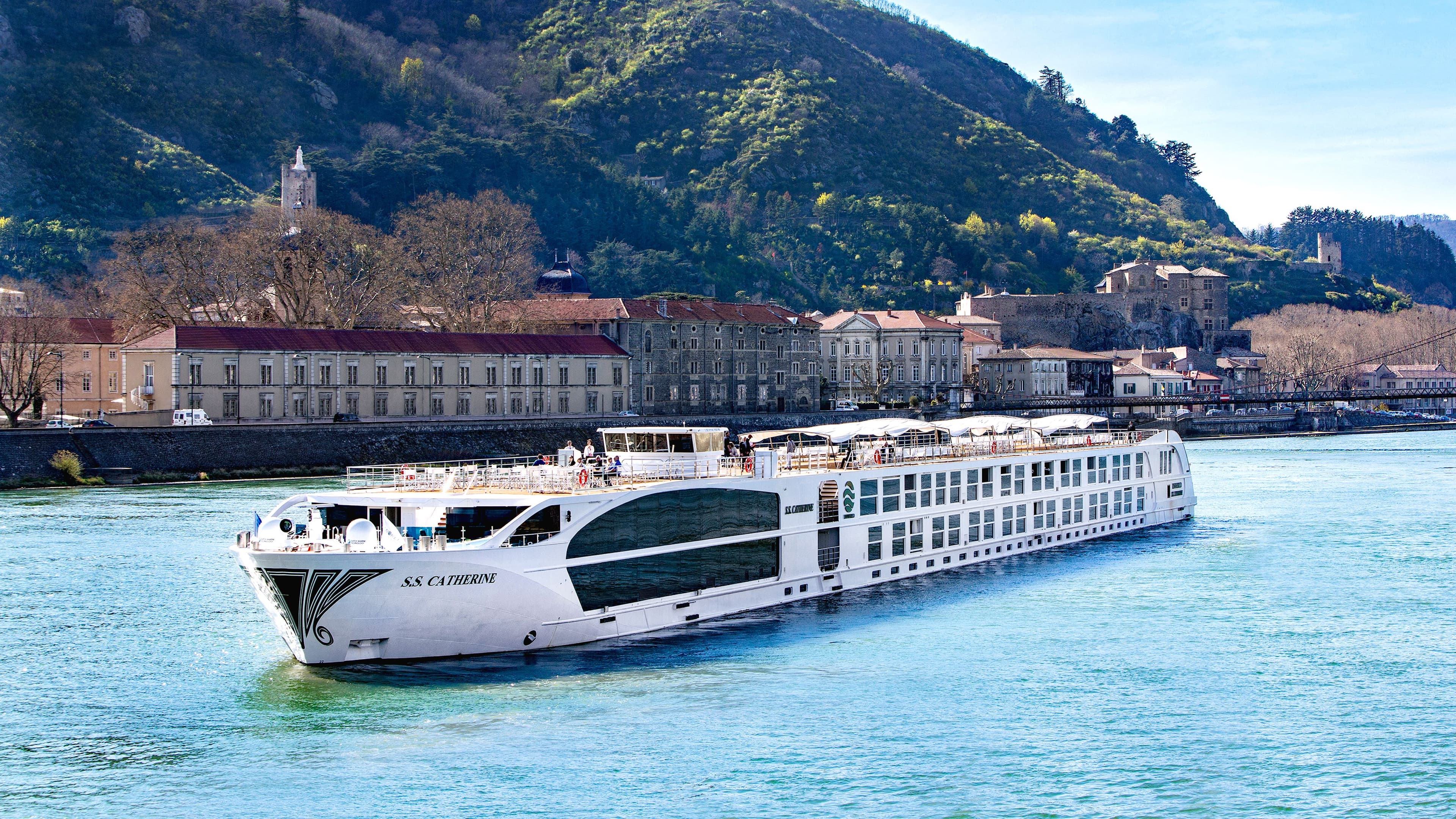Uniworld's S.S. Catherine sailing a European river.