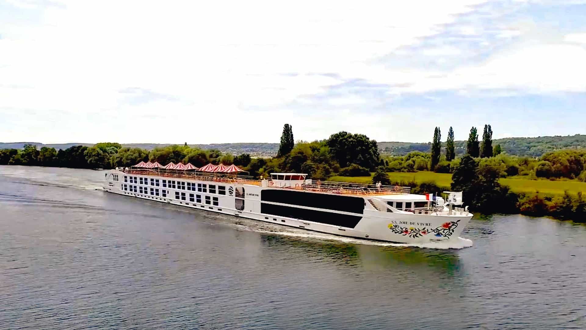 Uniworld's S.S. Joie de Vivre sailing a European river.