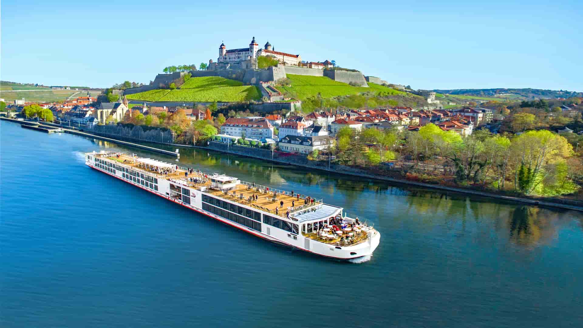 Viking Einar sailing with a castle behind it.