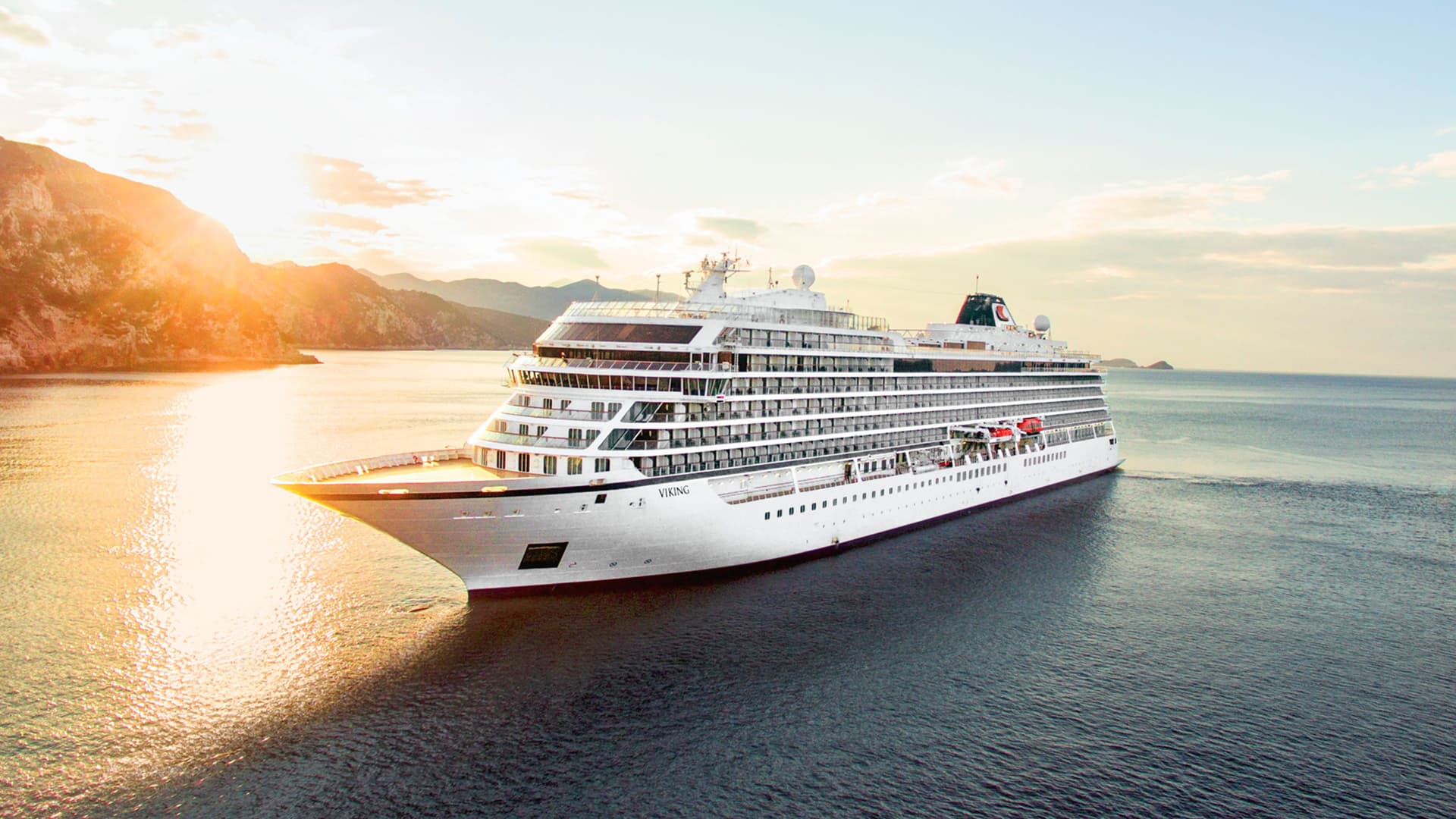 Viking Mars sailing at sunset.