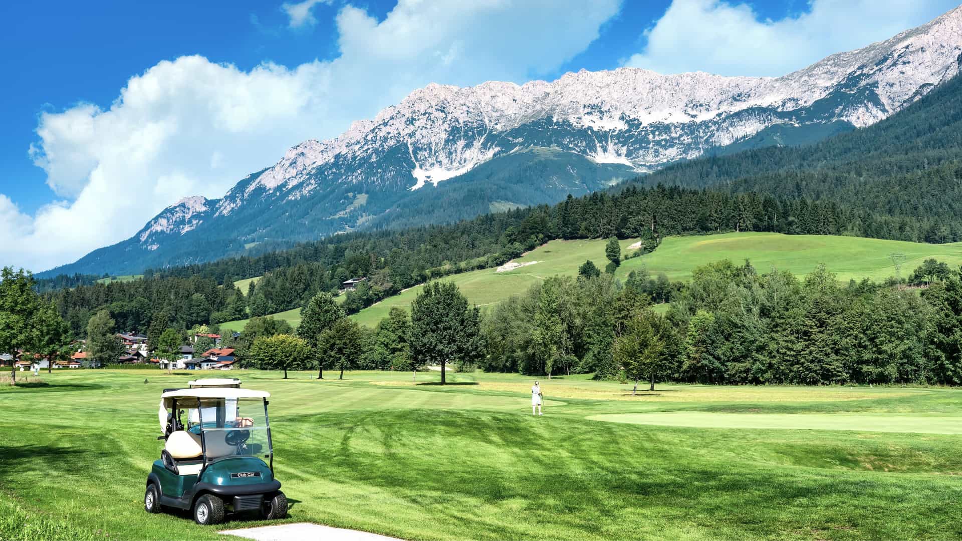 A golf course at the foothills of the Wilden Kairser mountains during a Daube River shore excursion in Austria.